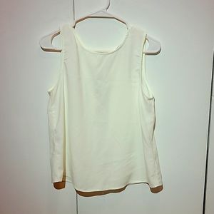 White tank top, opened line in back